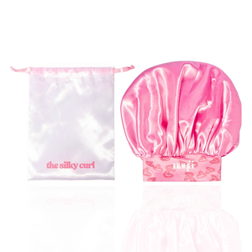 Bonnet de nuit Silky Curl en satin de soie rose avec sa pochette The Silky Curl
