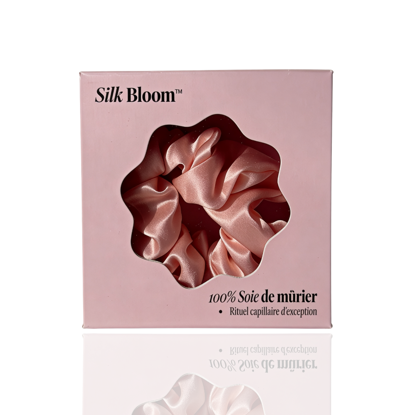 Chouchou Silk Bloom en soie de mûrier rose poudré dans son coffret naqä