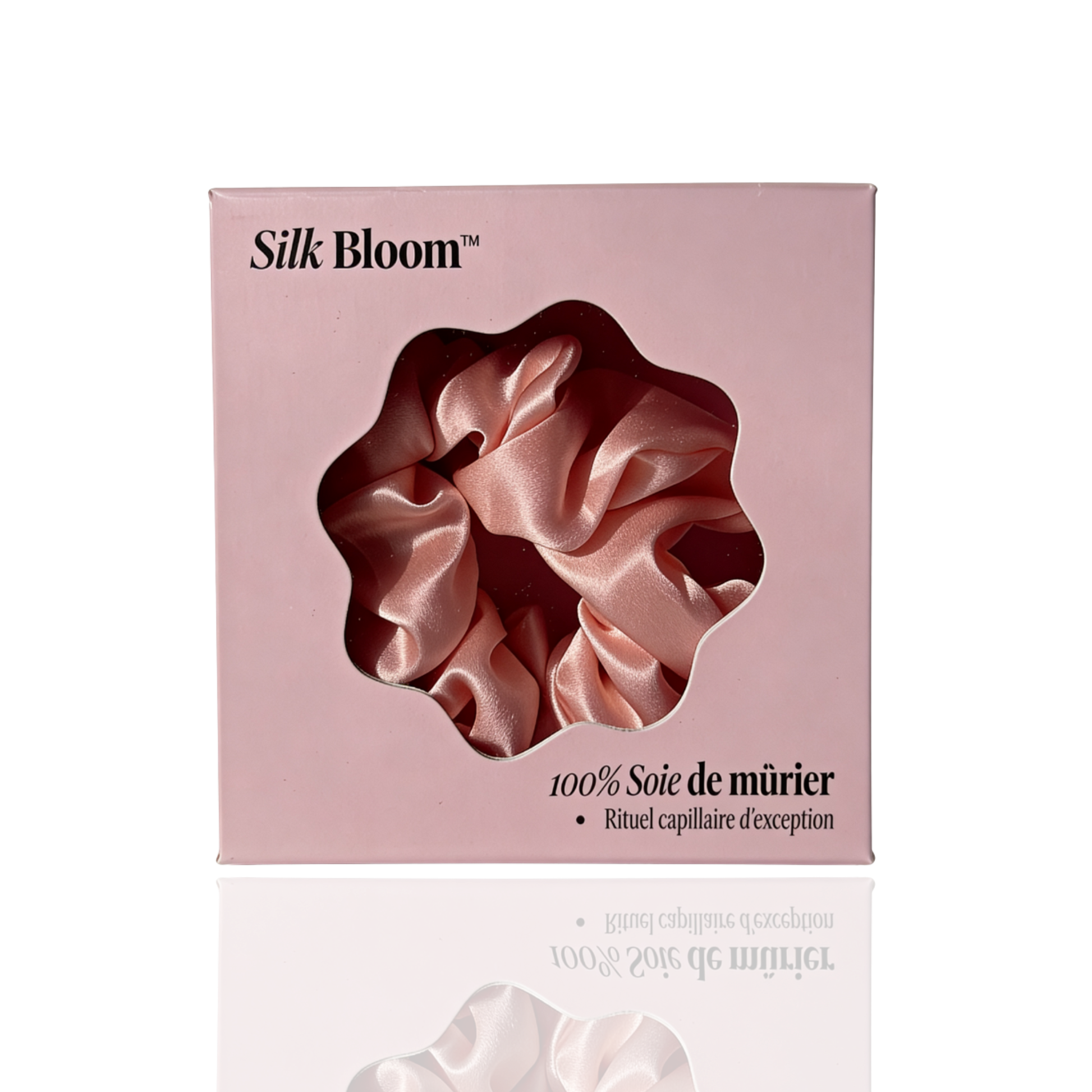 Chouchou Silk Bloom en soie de mûrier rose poudré dans son coffret naqä