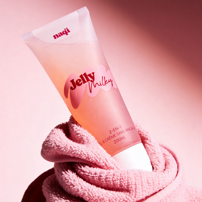 Tube Jelly Milky posé sur une serviette rose