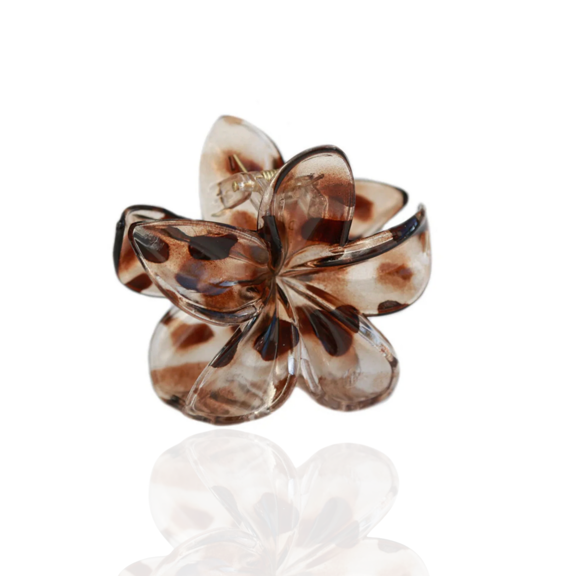 Pince fleur Vanilla Bloom effet écaille de tortue sur fond blanc